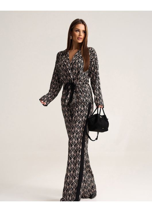 Як підібрати ідеальний брючний жіночий костюм для офісу та вечірок